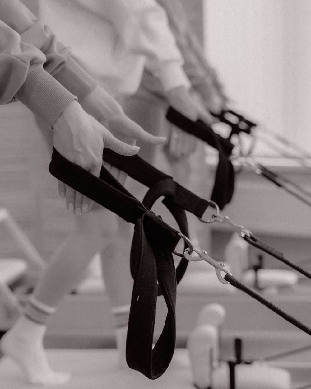 Girls with a good stretch are doing Pilates
